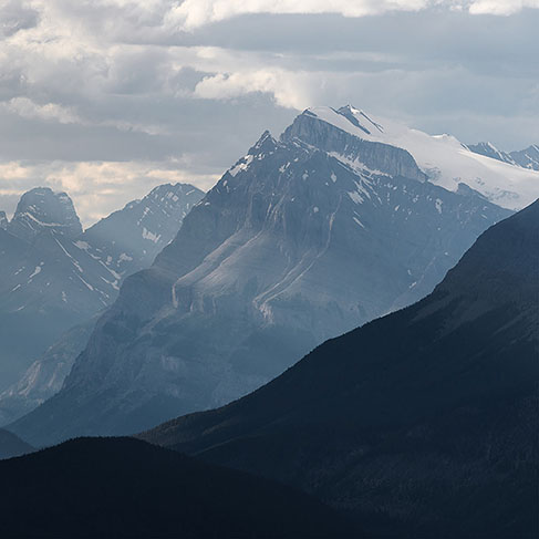 Dramatic snowy mountain landscape along the Icefields Parkway, Canada